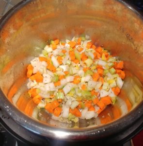 Vegetables sauteing in the Instant Pot®