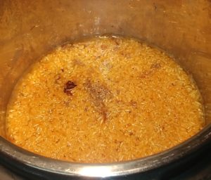 cooked rice in rich Fox Trot Farm lamb stock